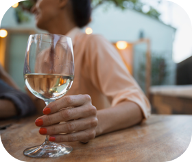 Woman holding a glass of wine Woman holding a glass of wine