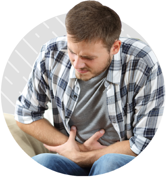 Man holding abdomen in pain