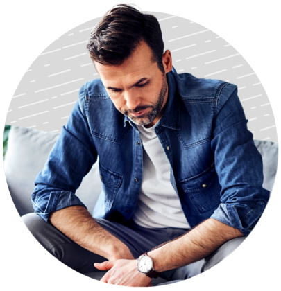 Man with Crohn's sitting on a couch.